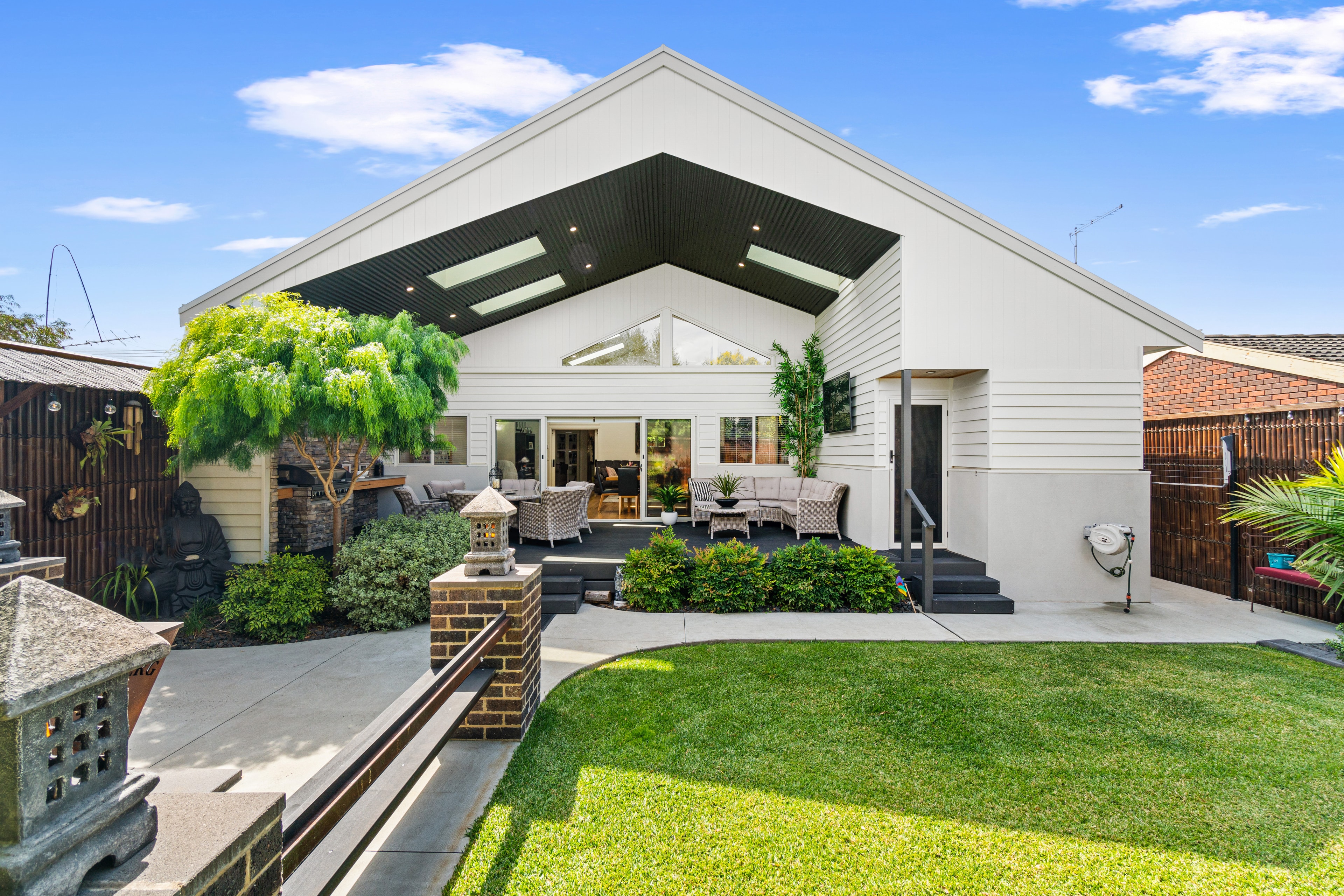 Modern home with alfresco entertaining area and landscaped garden