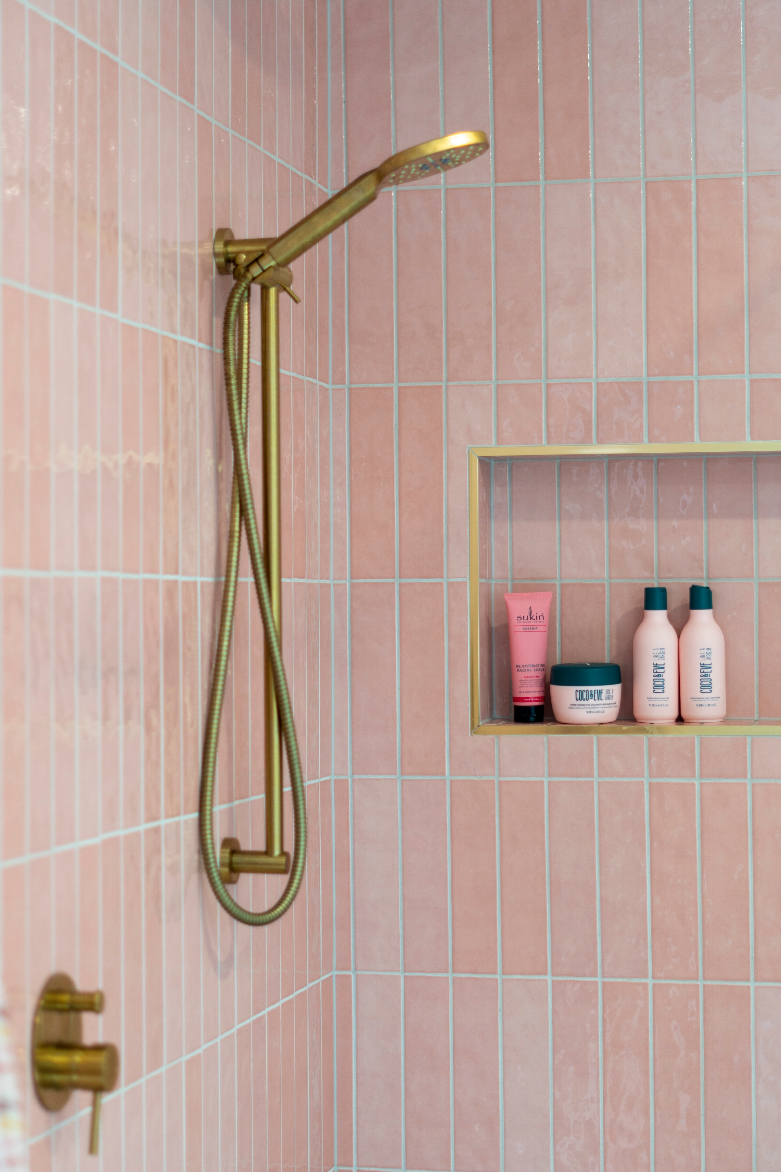 Brass showerhead with tiled niche shelf